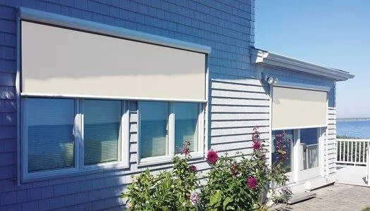 Exterior solar shades installed on a coastal North Carolina home